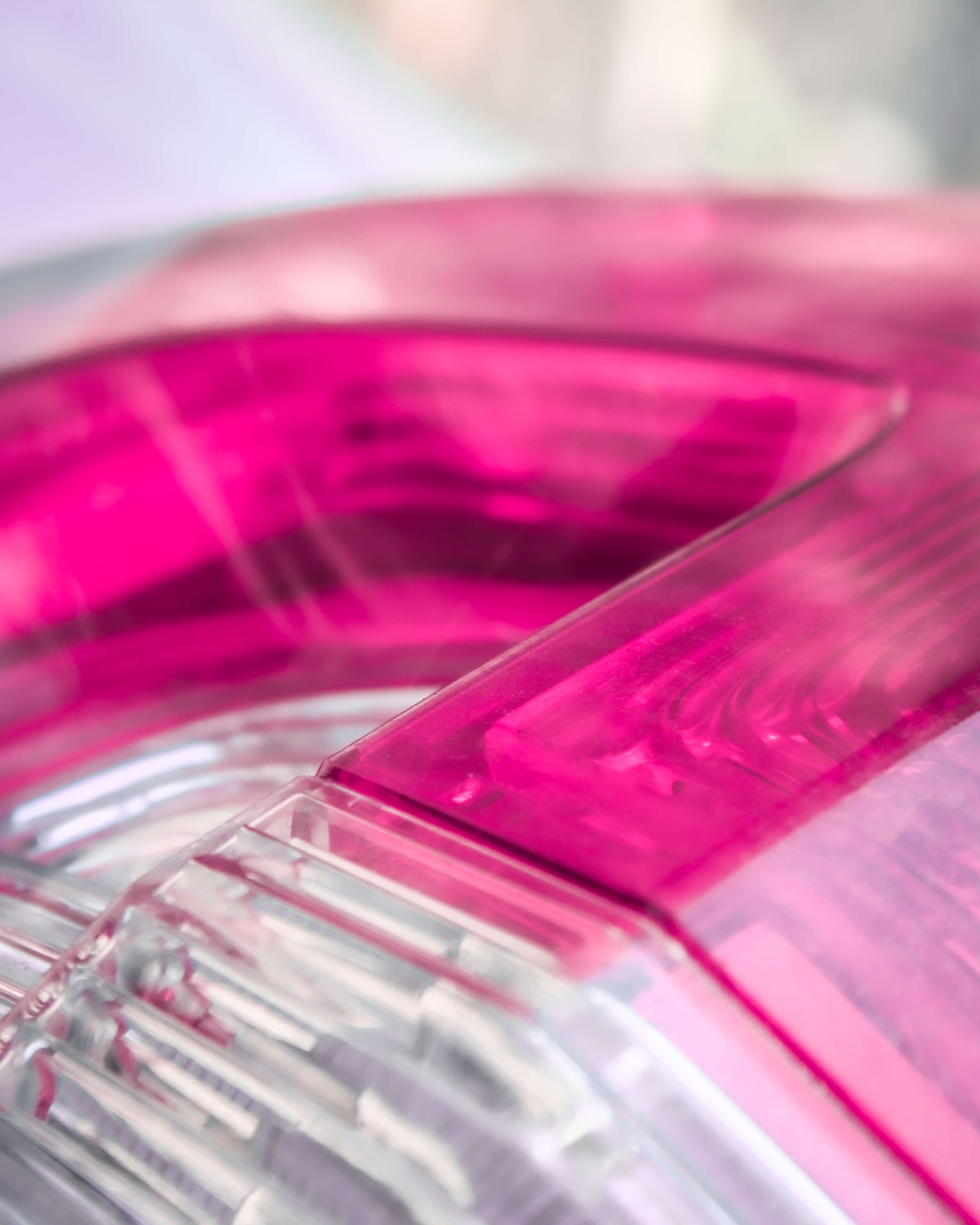A photograph of a car's headlight up close